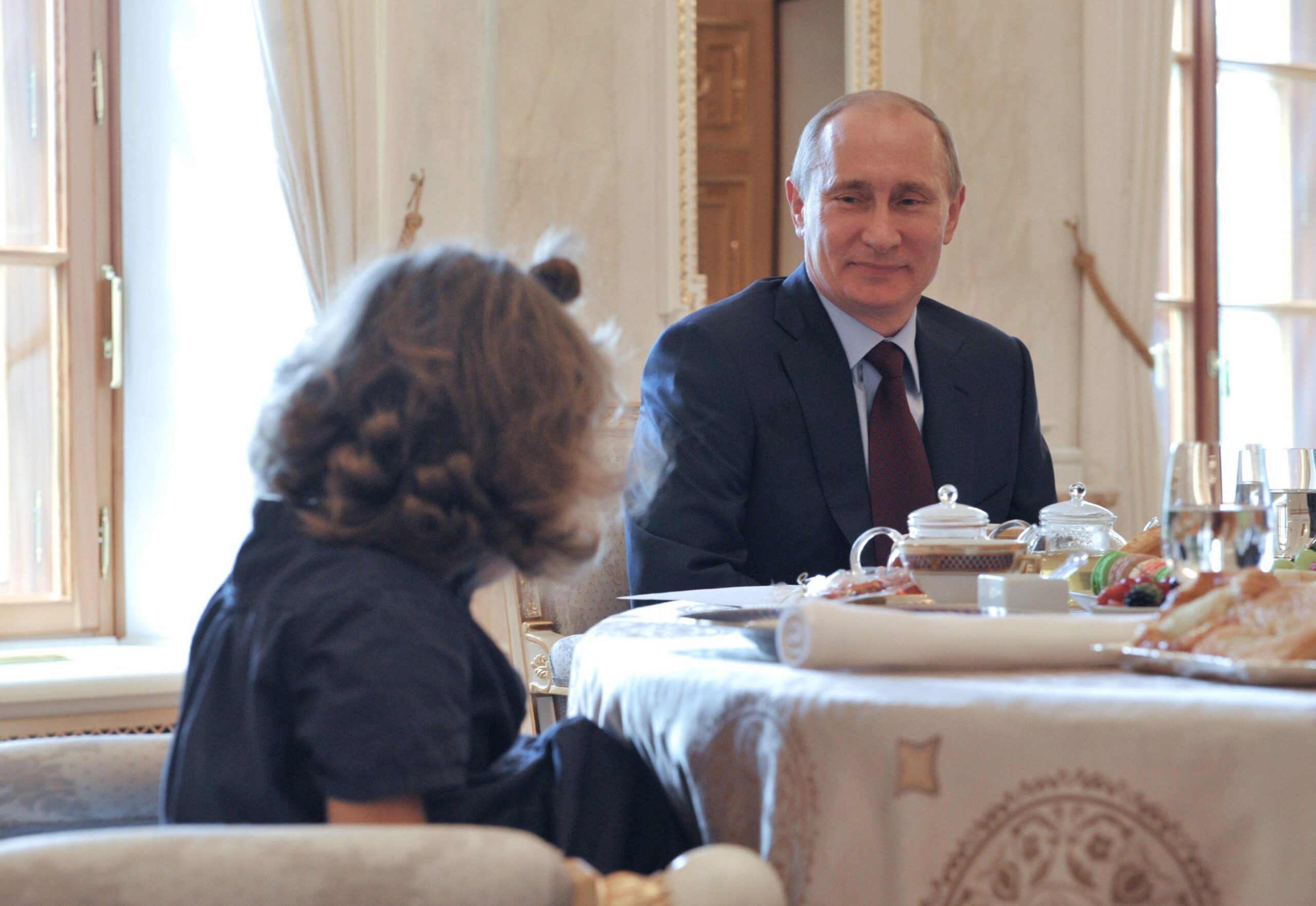 Russian President Vladimir Putin meets four-year-old Vera Smolnikova02