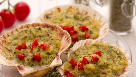 Ricette di pesce: capesante gratinate alla provenzale