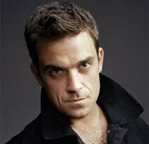 Robbie Williams, show da musical e duetto col padre