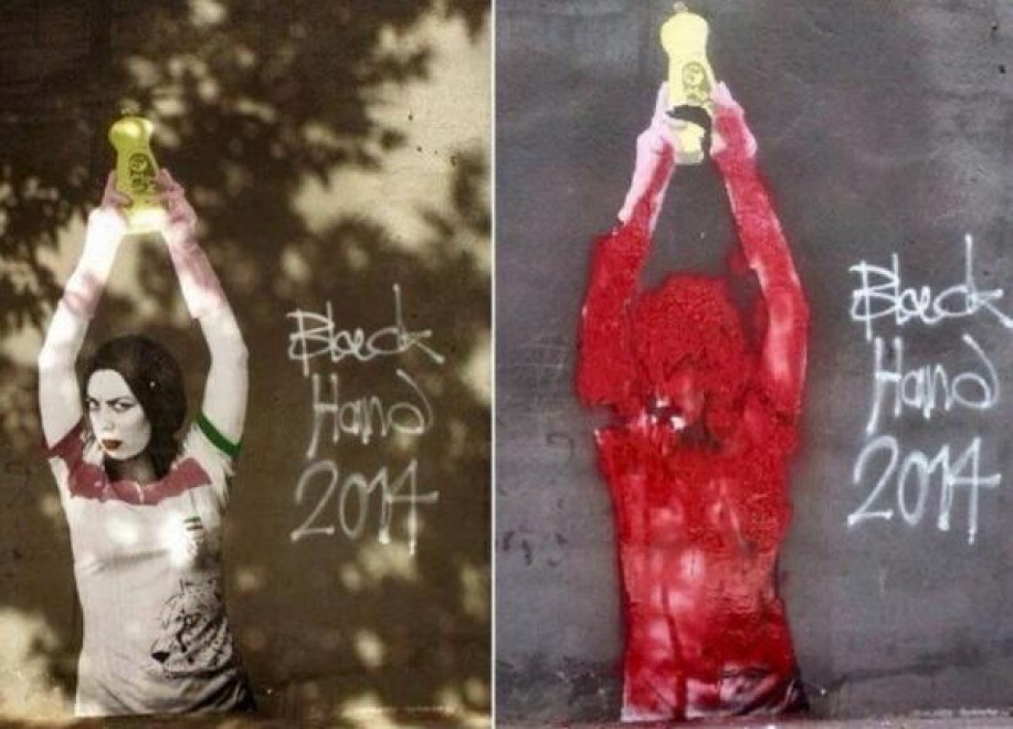 Teheran, censurato il graffito della donna con la Coppa del Mondo03