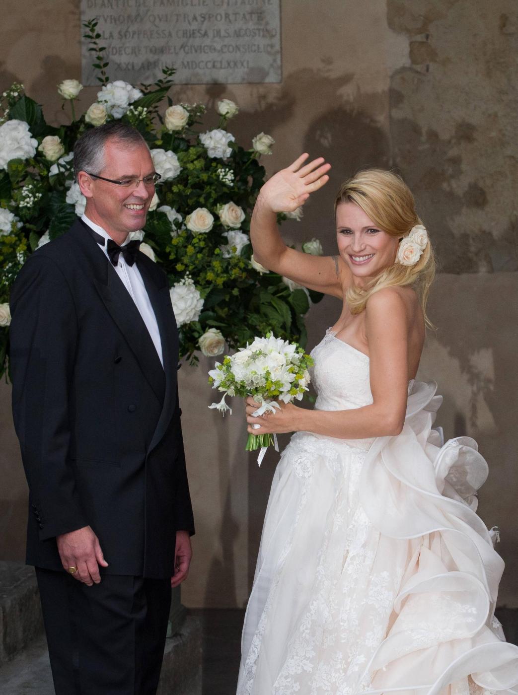 Michelle Hunziker e Tomaso Trussardi sposi. Le prime foto delle nozze