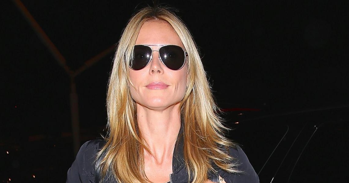 Heidi Klum cute and casual flying solo