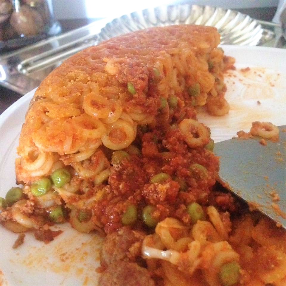 Timballo di Anelletti al Ragù di Carne e Piselli Timballo di Anelletti al Ragù di Carne e Piselli